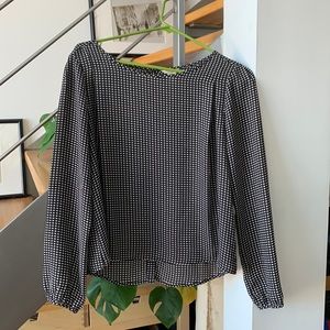Silky blouse. Worn once. Button up back. Black and white pattern. Cuffed sleeves
